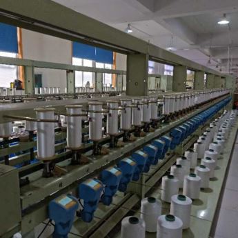 Machine de rebobinage automatique de fil semi-peigné